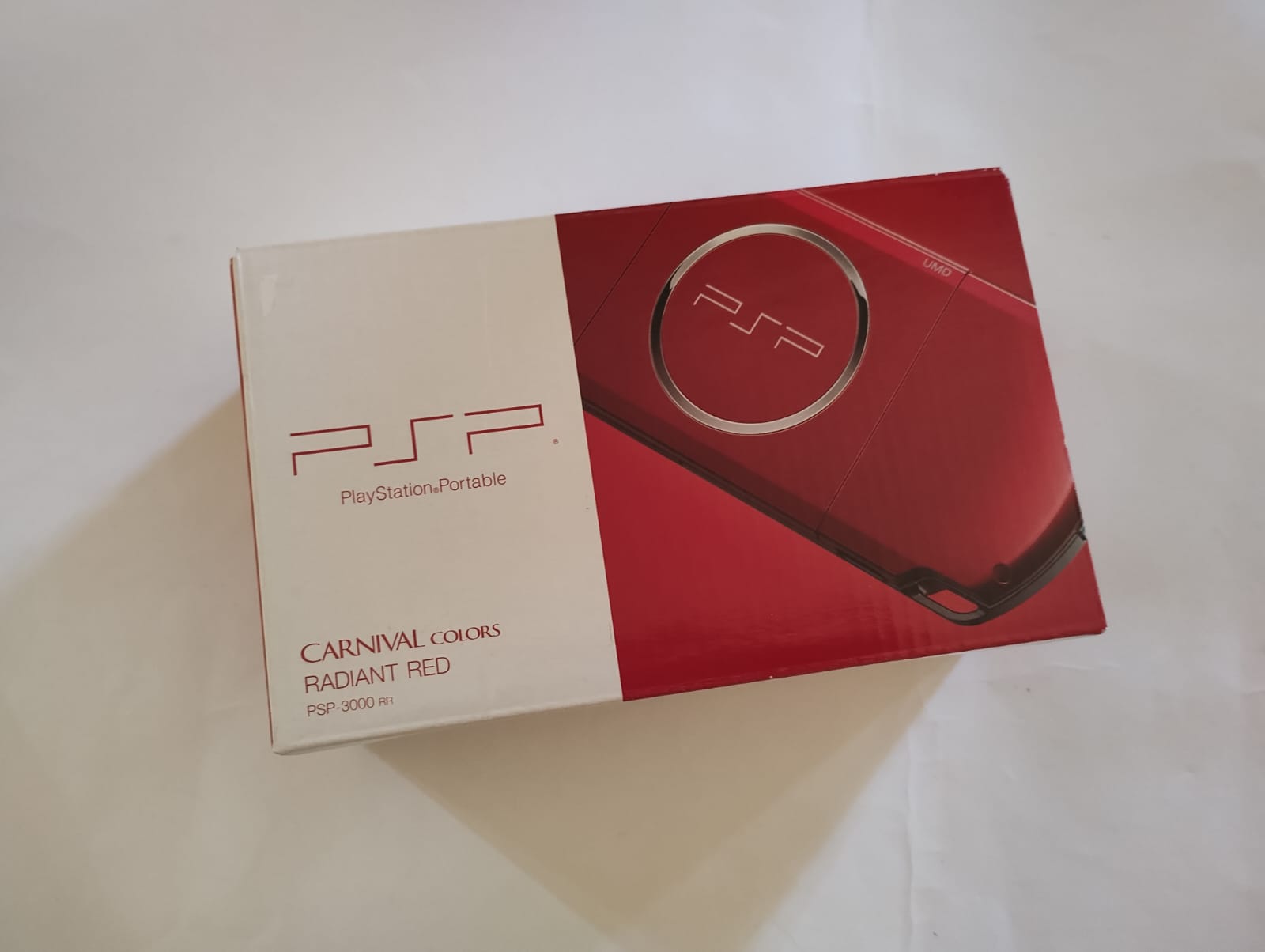 psp slim color rojo con caja